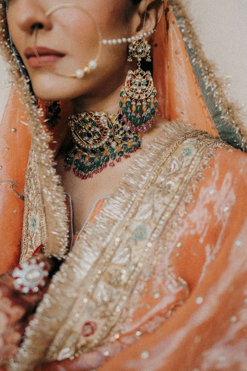 Old family jewellery styled for a modern wedding outfit