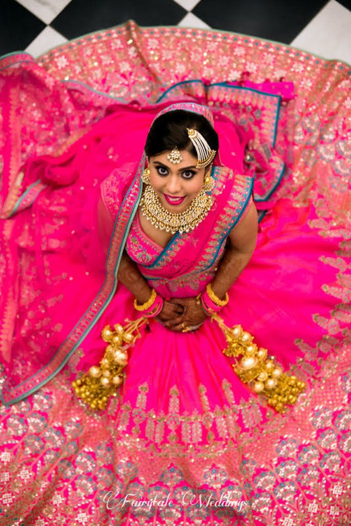 Photo of Stunning bridal neon and hot pink lehenga for wedding