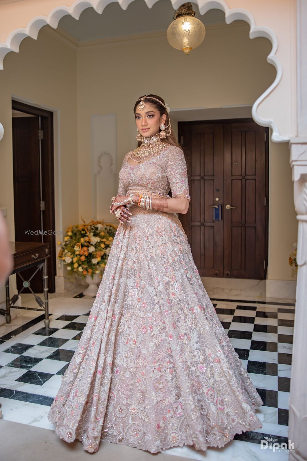 Photo of Heavy bridal lehenga in light pink and grey hues with gorgeous jadau and polki bridal jewellery