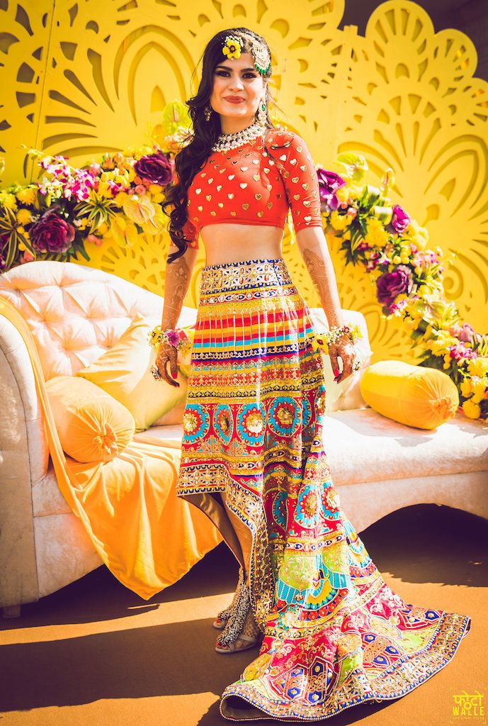 Photo of Unique mehendi lehenga with high low skirt