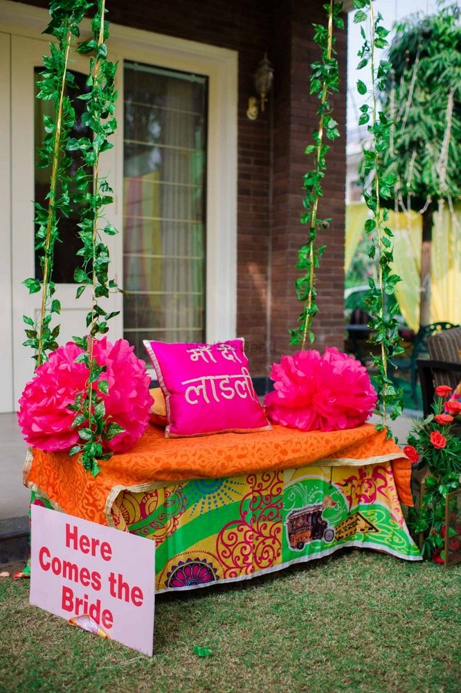 Photo of Bridal seat on mehendi with funky cushions