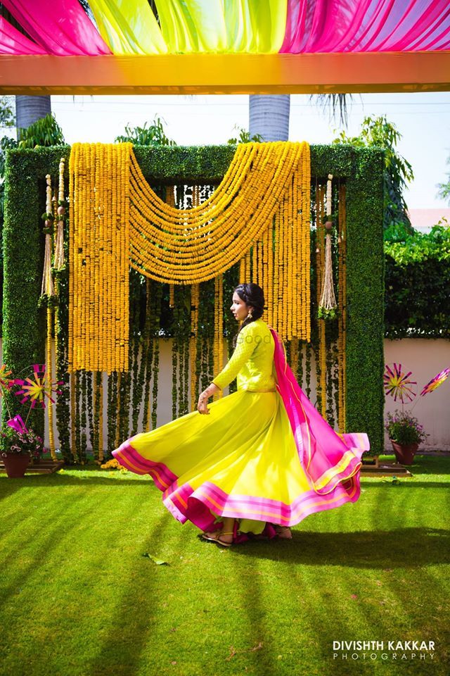 Photo of Lime green outfit for mehendi in pink and green