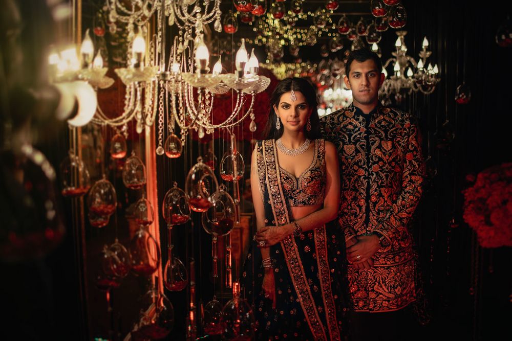 Photo of Twinning matching bride and groom on sangeet