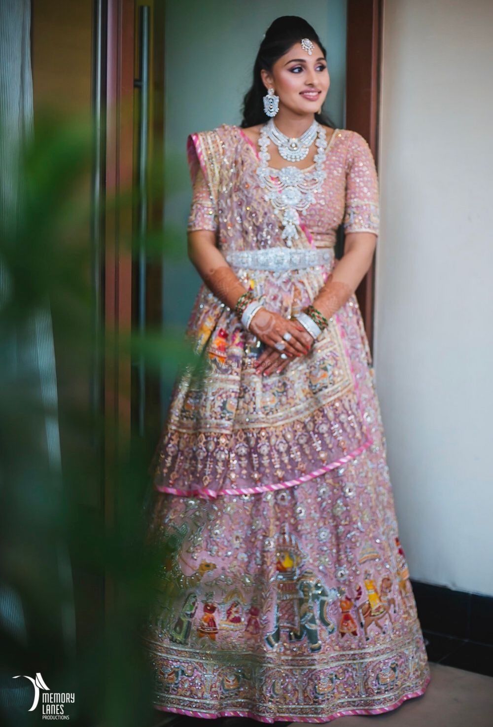 Photo of Light pink sangeet lehenga with diamond jewellery