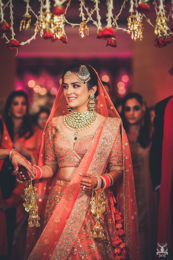 Photo of Pretty bridal portrait in peach lehenga