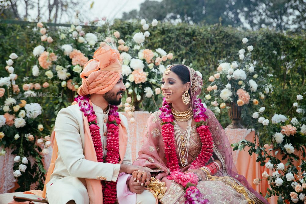 Photo of A cute wedding day couple portrait