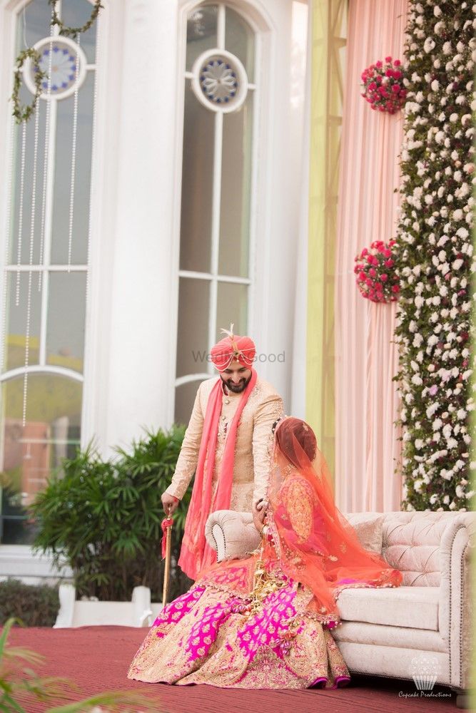 Photo of Pink and orange bridal lehenga