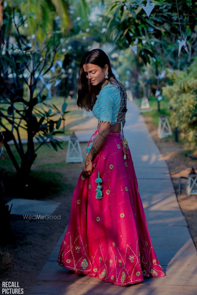 Photo of Light lehenga for mehendi in turquoise and pink