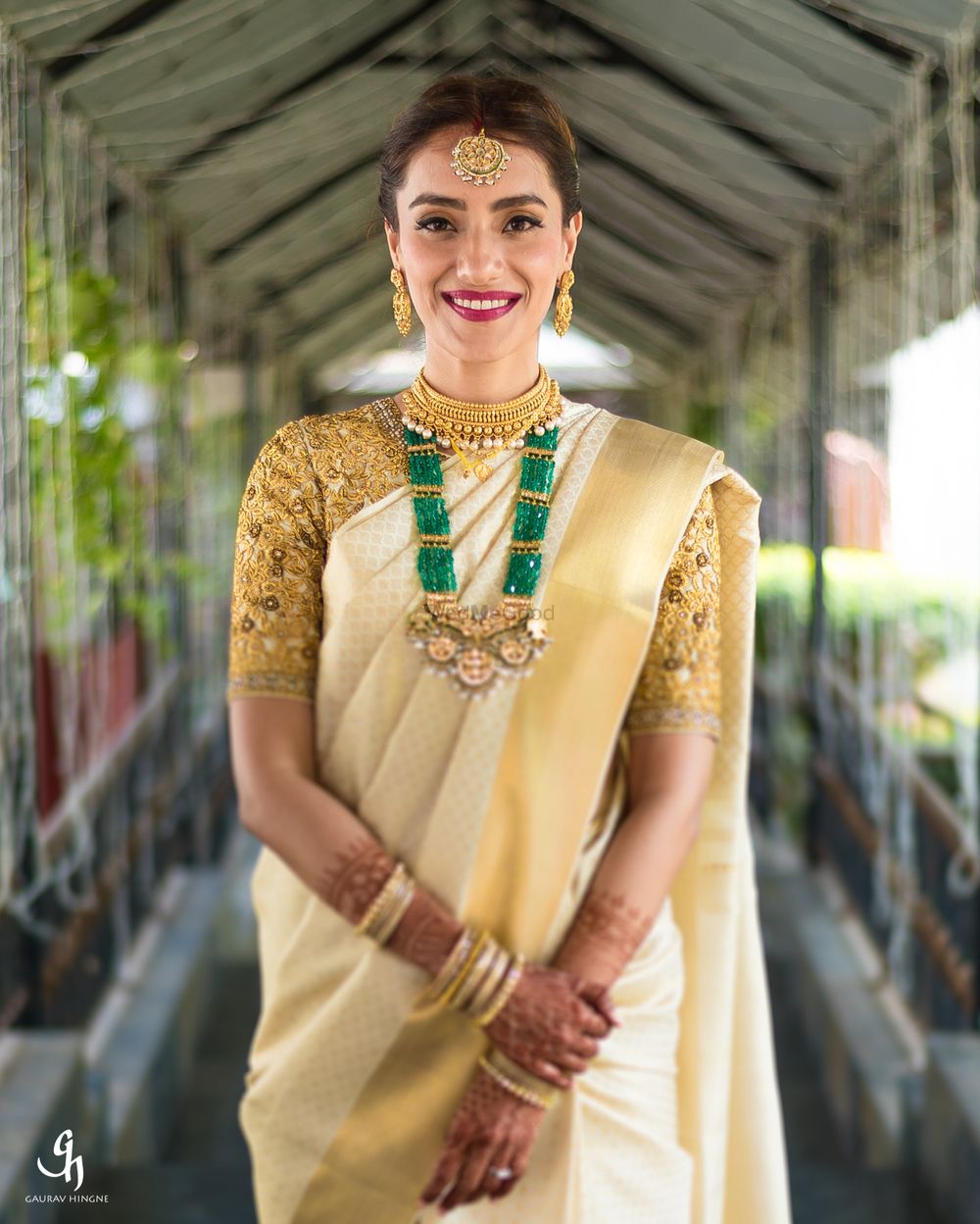 Photo of South Indian bridal look with green bead jewellery
