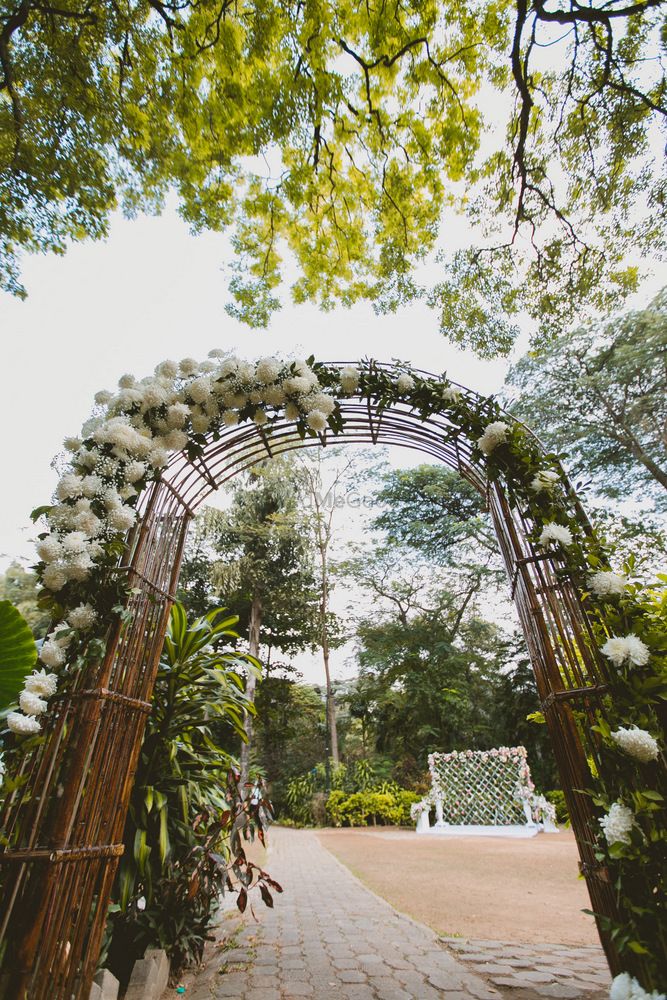 Photo of Floral entranceway with white roses