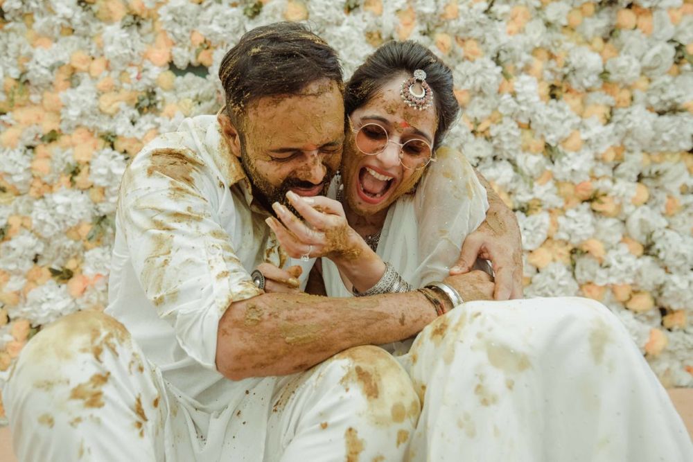 Photo of Fun couple shot on Haldi