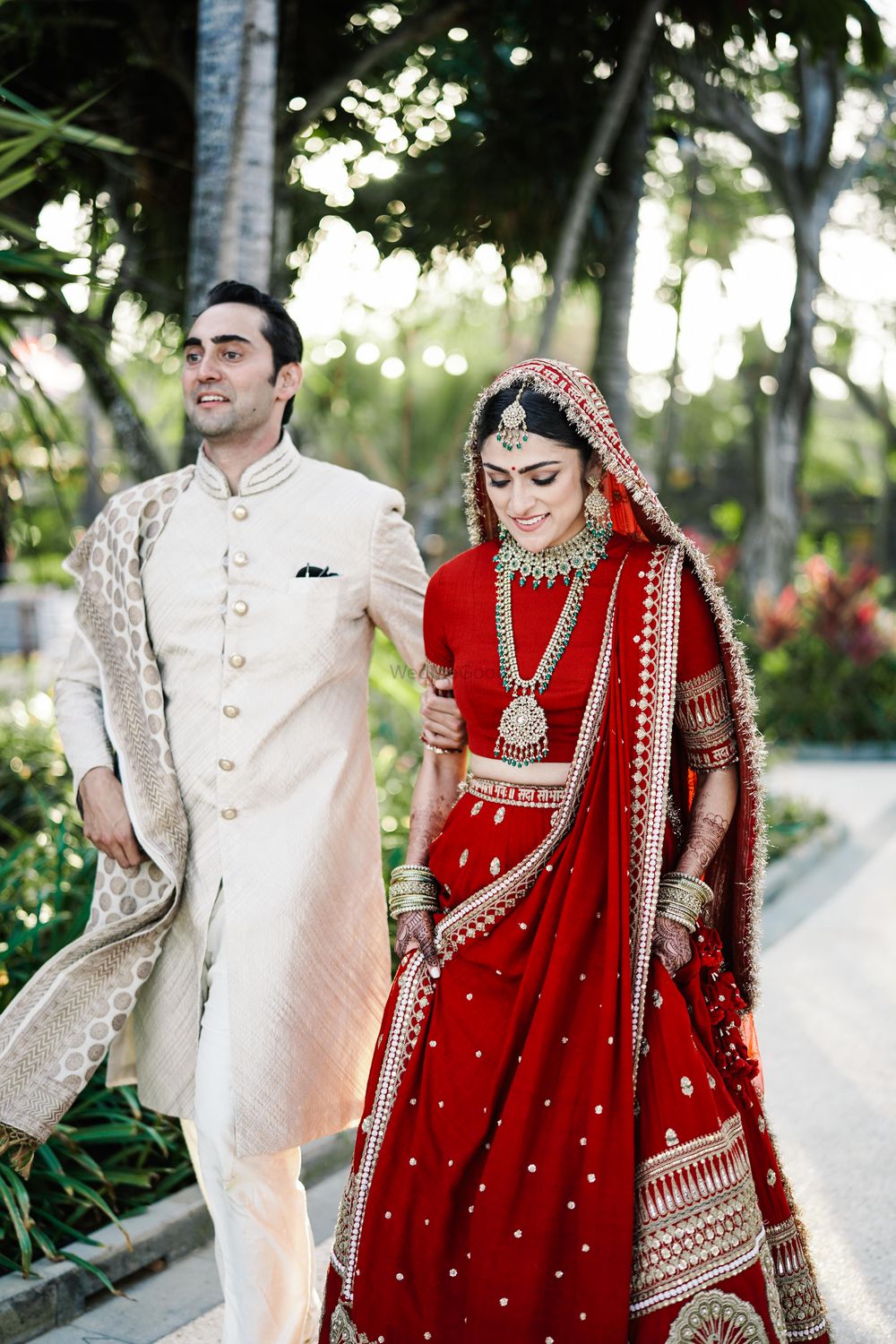 Photo of Bride and groom together, in traditional colours