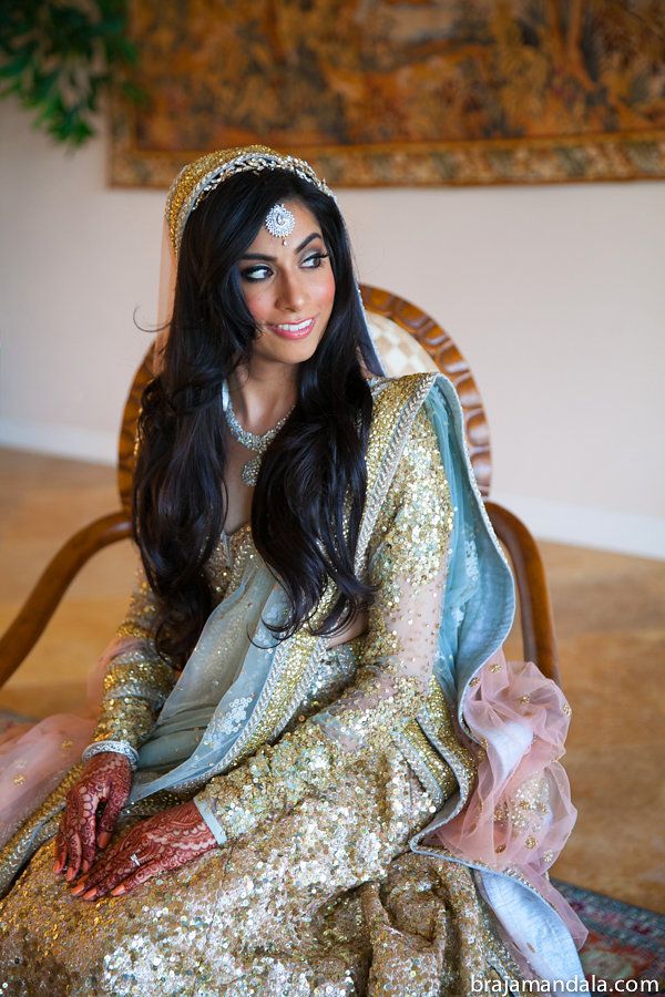Photo of Glittery gold lehenga with full sleeves sequin