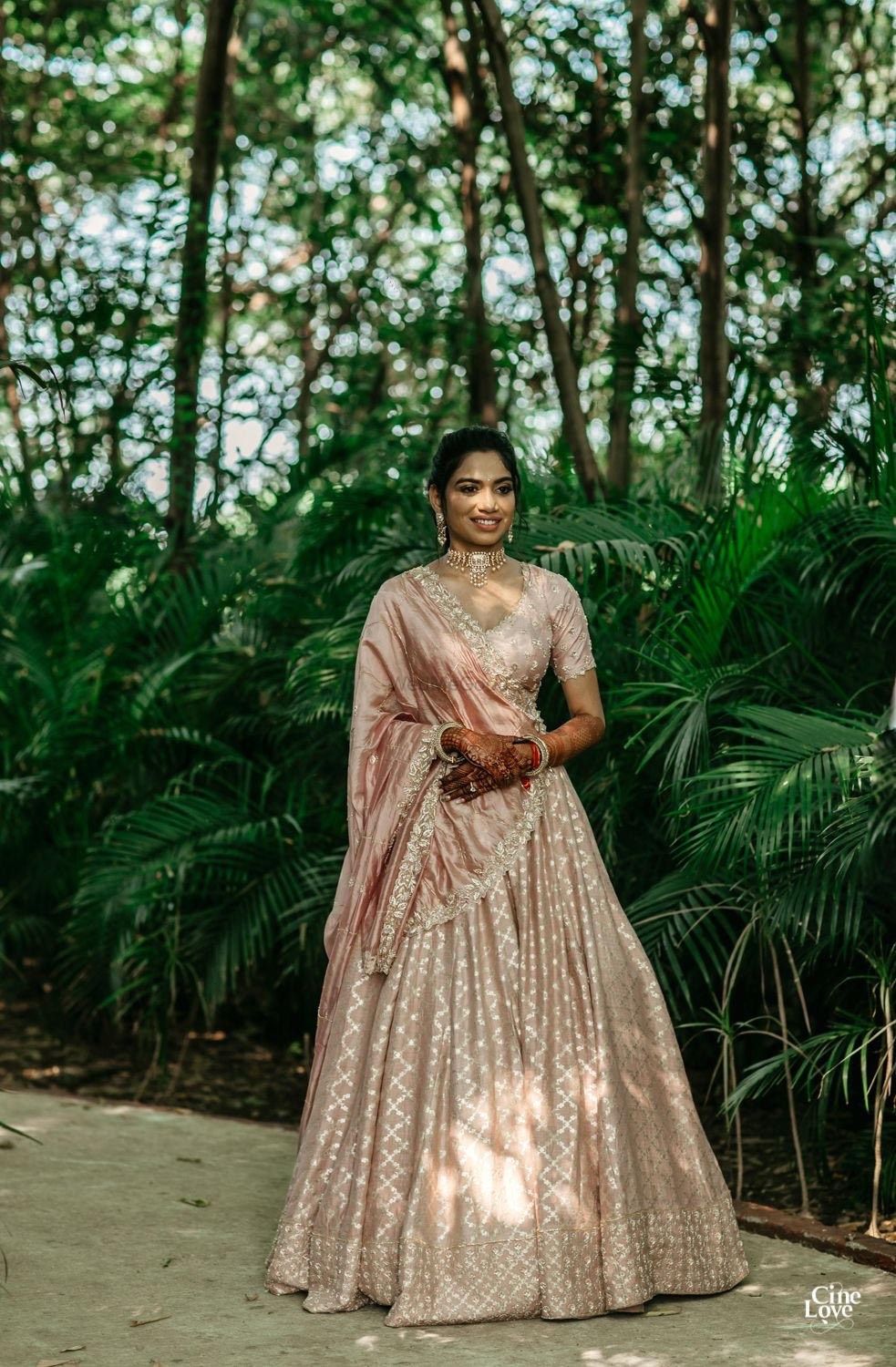 Photo of Bride wearing a blush pink lehenga for her bhaat ceremony
