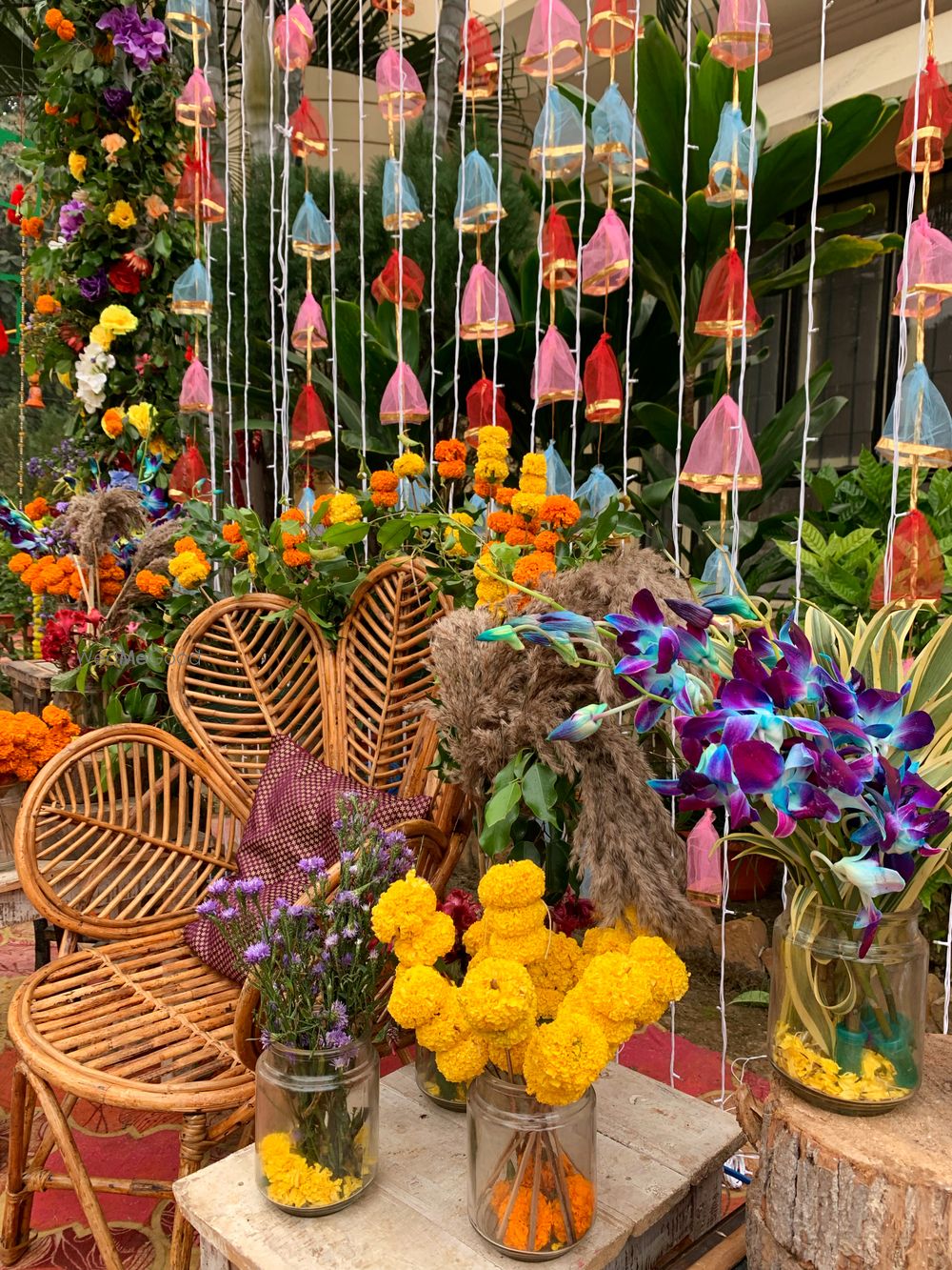 Photo of Mehendi decor with cane chairs