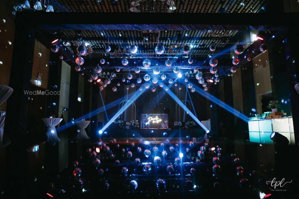 Photo of Trending and edgy disco ball themed cocktail night decor elements