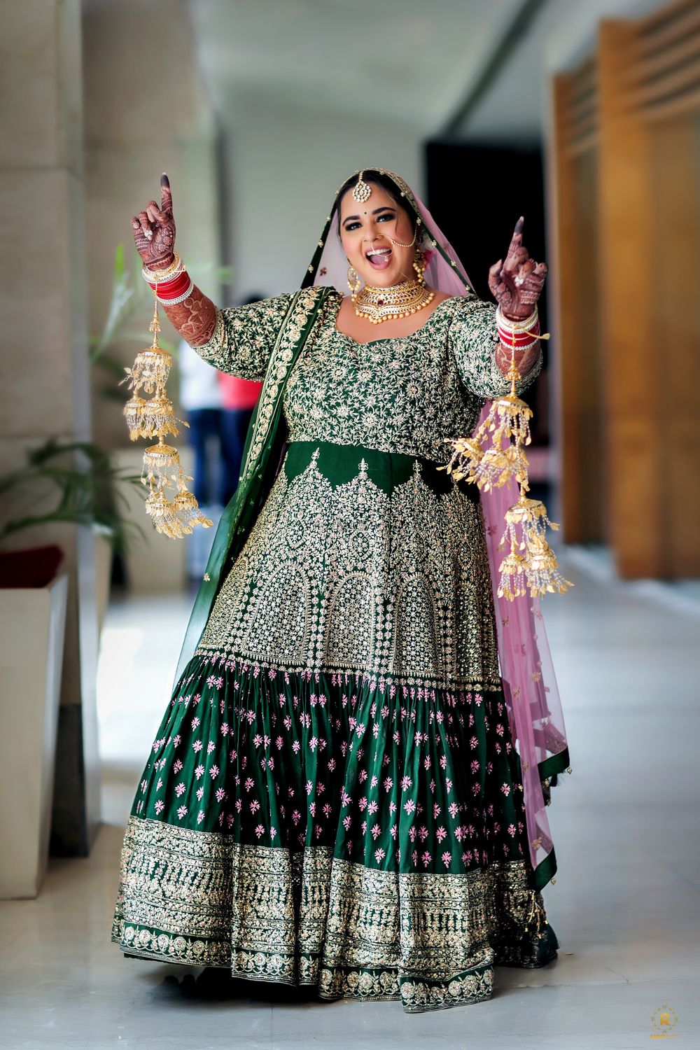 Photo of bridal look in green anarkali for plus size bride