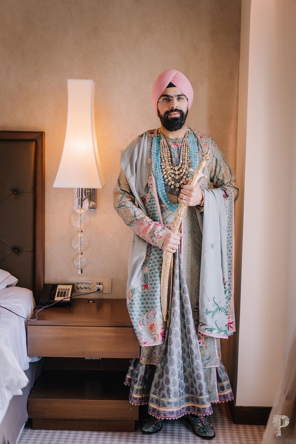 Photo of sikh groom in a unique sherwani for his wedding