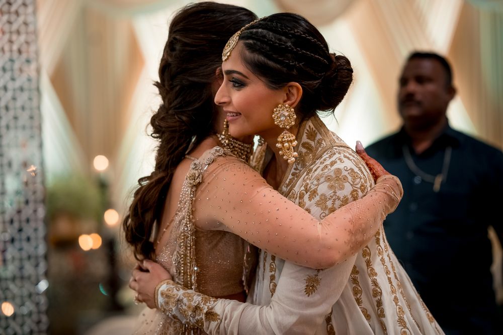 Photo of Sonam kapoor at wedding hugging bride