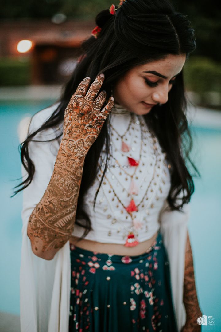 Photo of A bridal portrait with the focus on mehendi