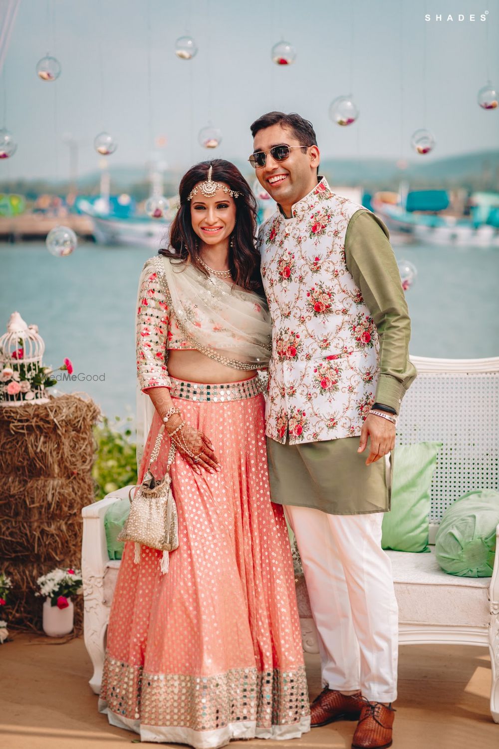 Photo of Abride and groom coordinating on their mehndi ceremony