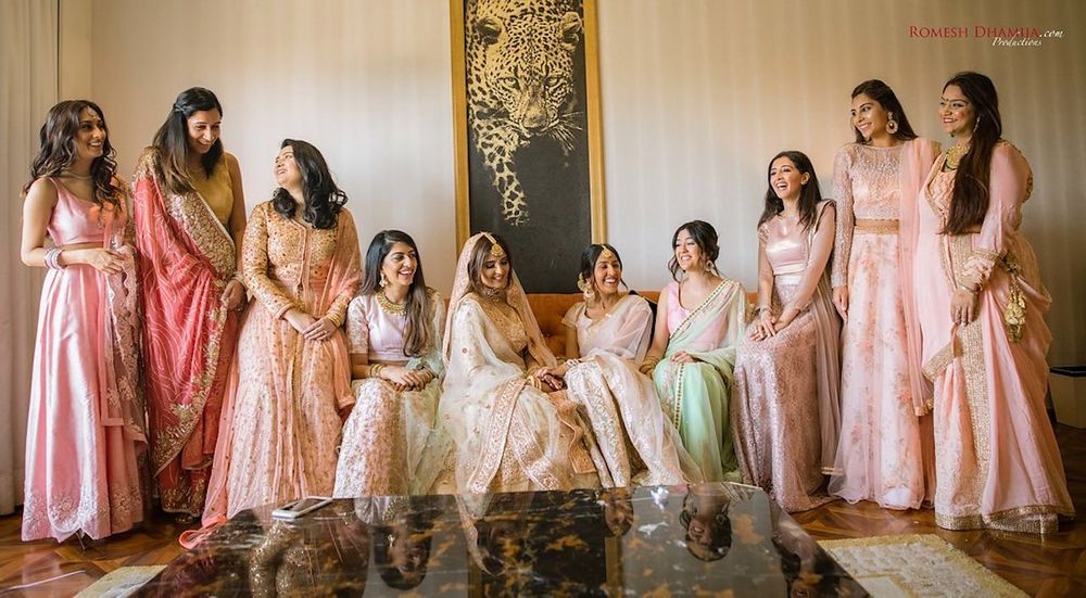 Photo of Coordinated bridesmaids in pastels