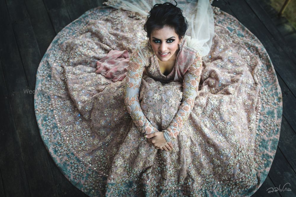 Photo of Bridal portrait idea with Sabyasachi lehenga flared out