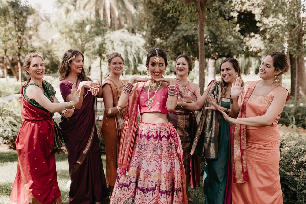 Photo of Beautiful bride with bridesmaids