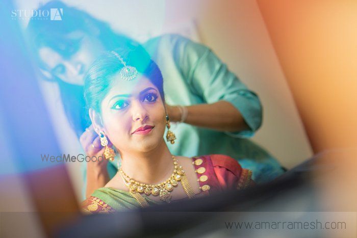 Photo of Bride Getting Ready - Gold Maangtikka