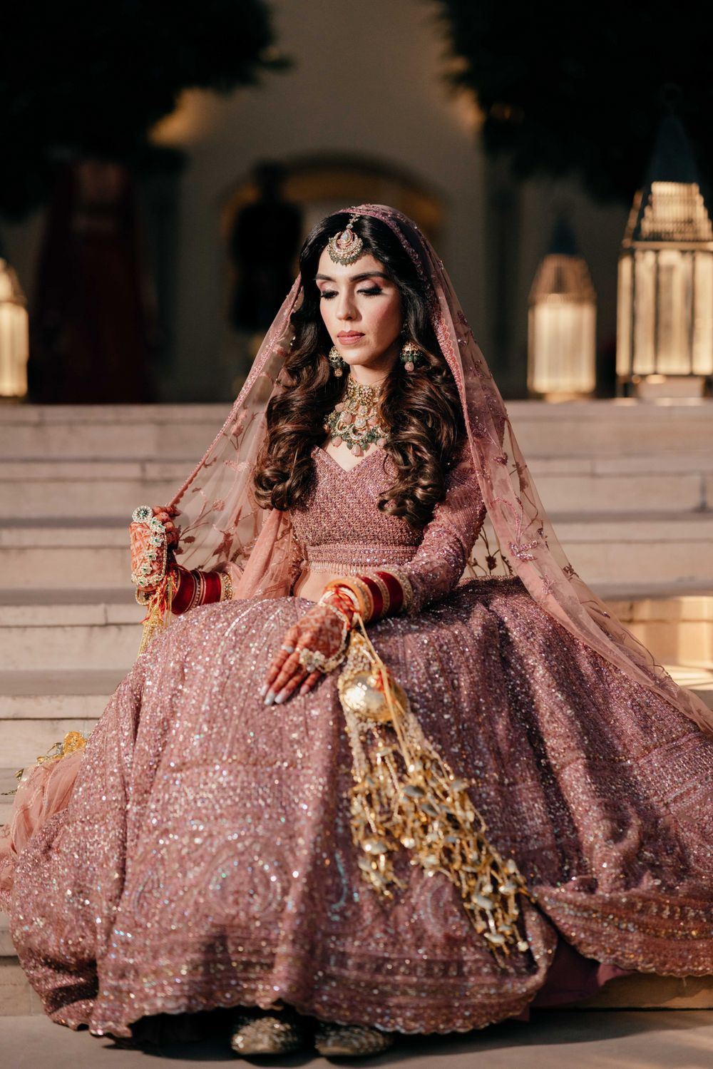 Photo of Onion pink lehenga for a bride with open hair offbeat look