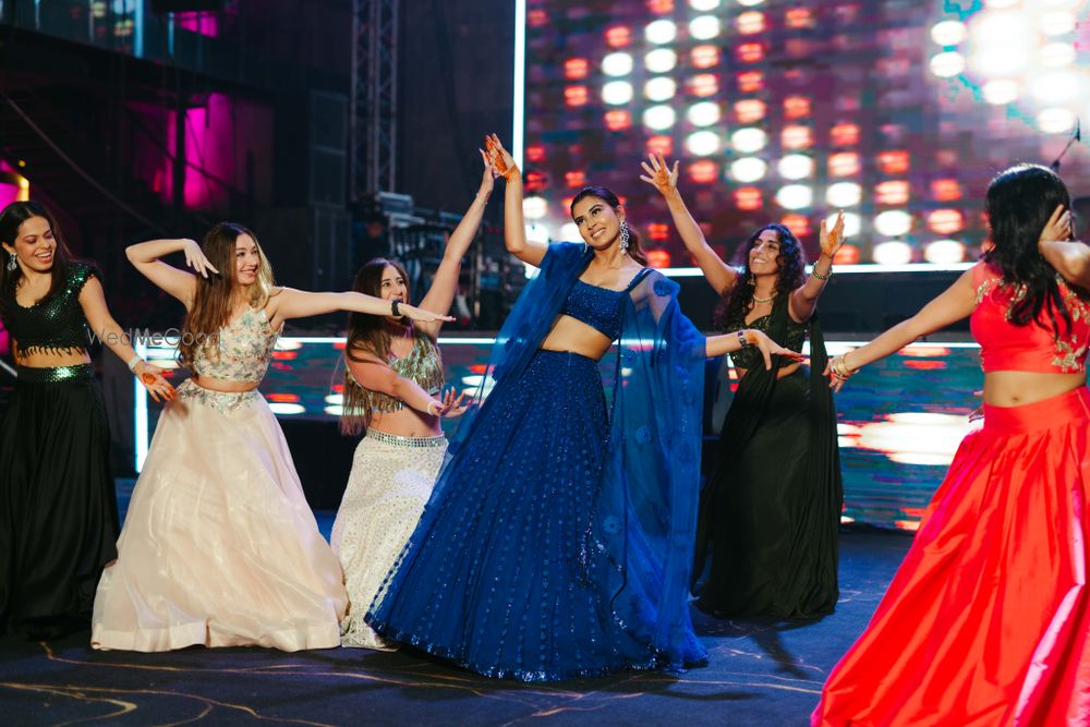 Photo of Bride and her squad on the sangeet dance floor