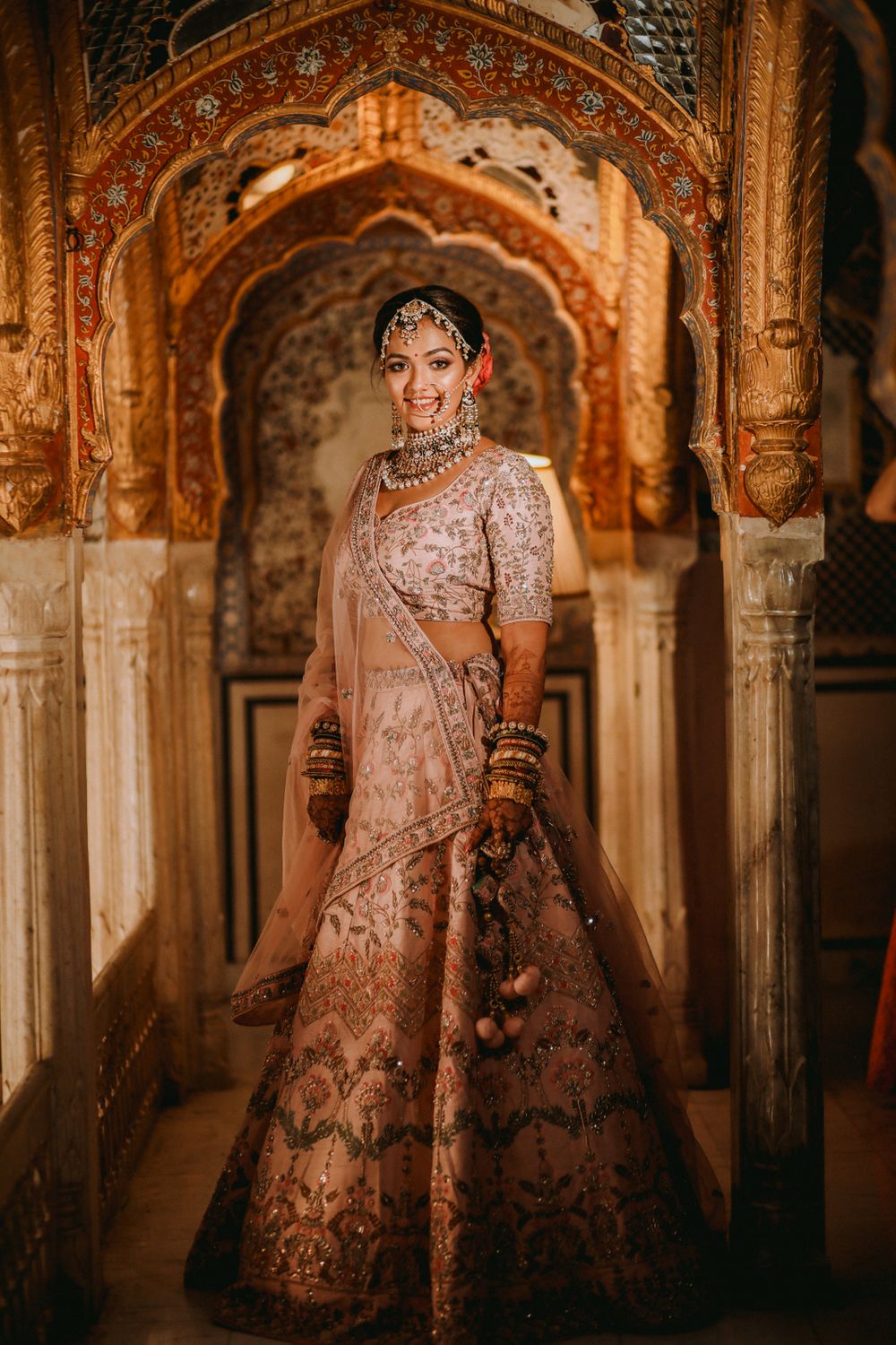 Photo of bridal lehenga with traditional embroidery