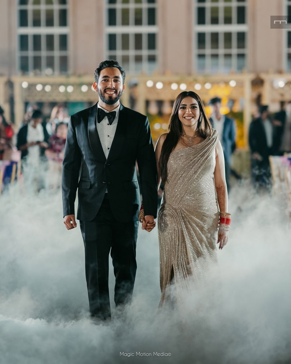 Photo of reception couple entry with smoke all around