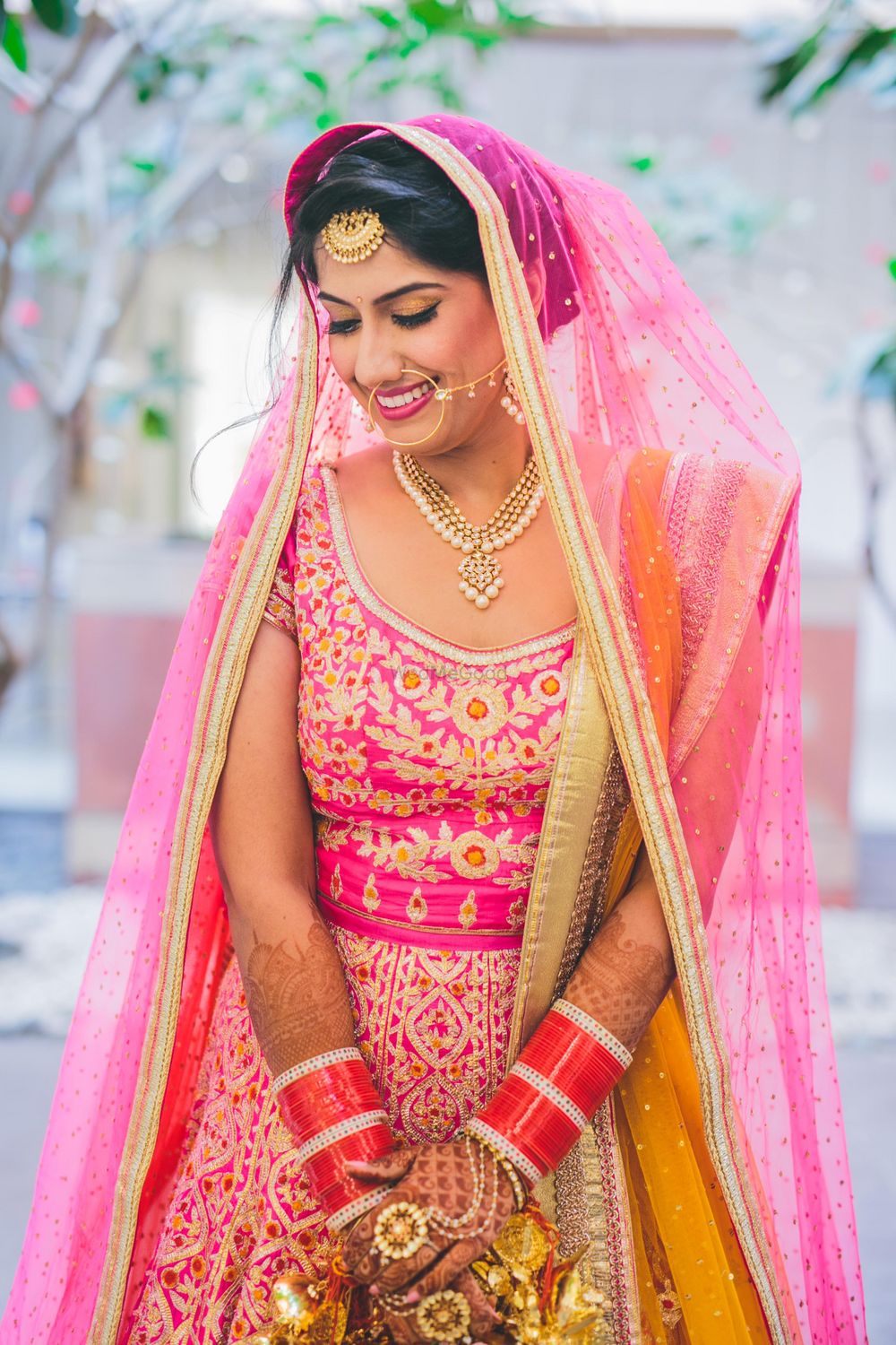Photo of bright pink bridal lehenga  by shyam narayan prasad
