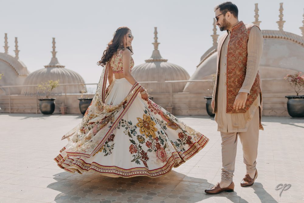 Photo of bride twirling on mehendi day