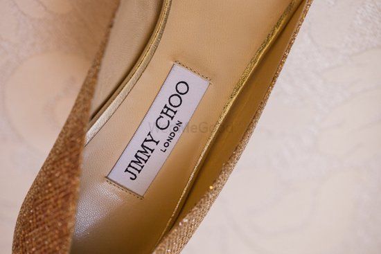Photo of Jimmy choo gold shoes