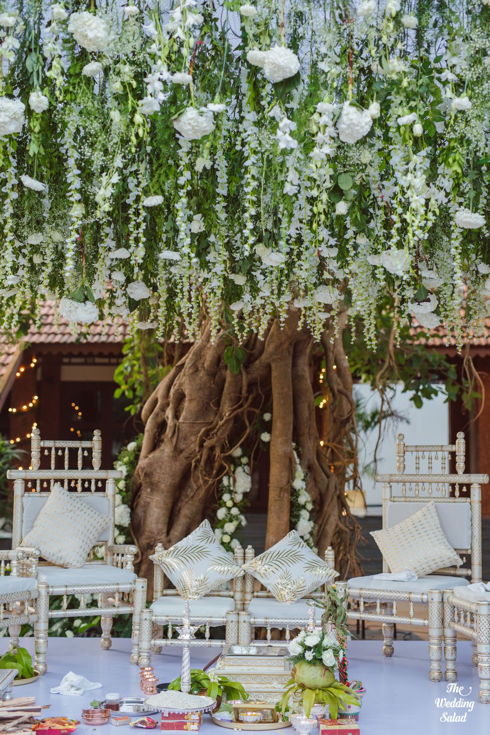 Photo of White floral mandap decor.
