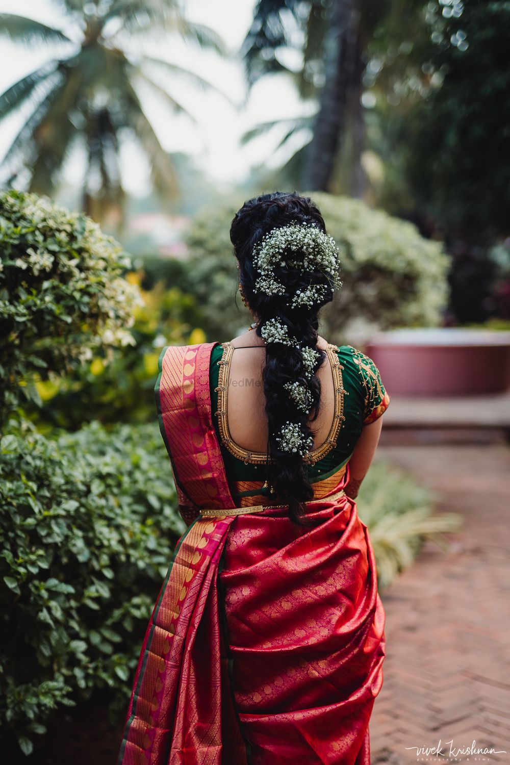 Photo of Fusion south indian bride with babys breath hair braid