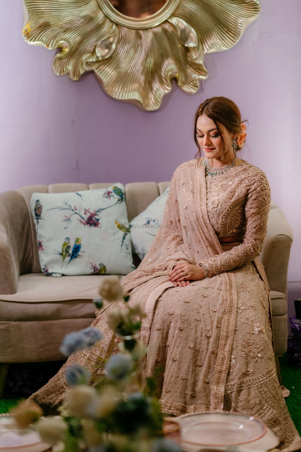 Photo of Bride in a blush pink lehenga for the Sangeet