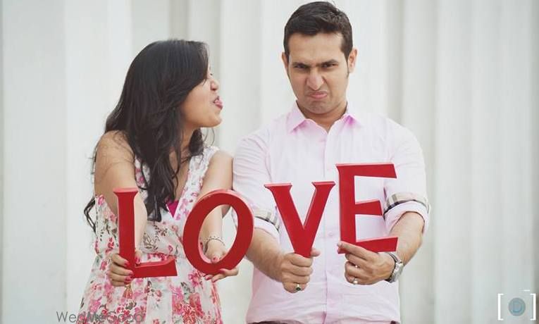 Photo of Using LOVE letters in the pre wedding shoot