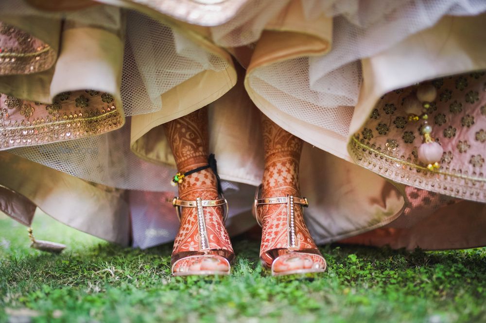 Photo of Pretty gold sandals with jeweled detailing