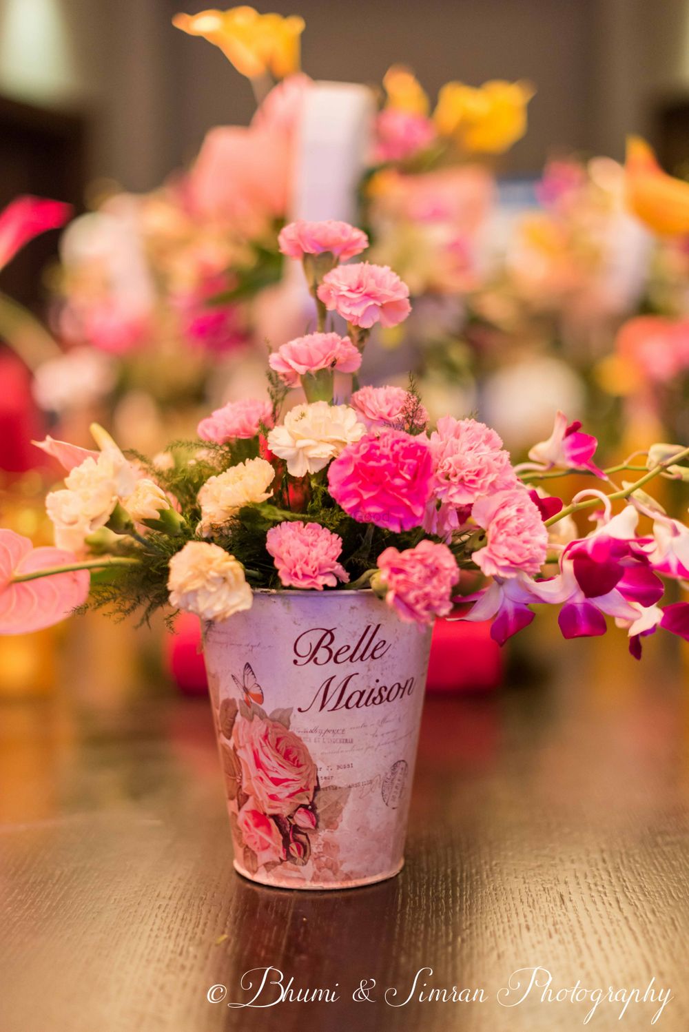 Photo of Floral roses in vintage bucket