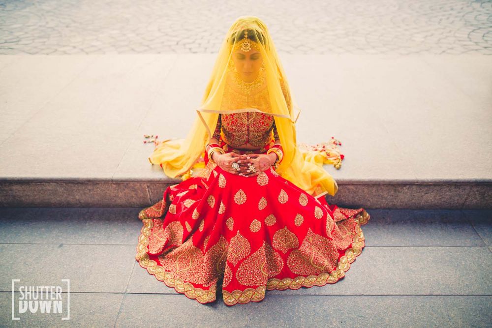 Photo of Red and yellow bridal lehenga