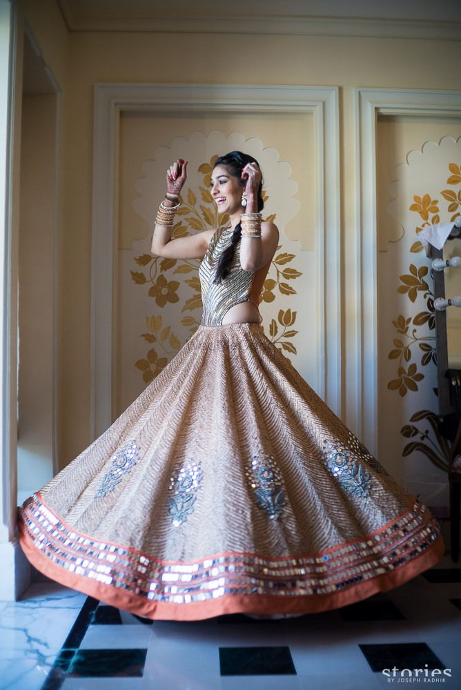 Photo of Cutout gown in peach and grey for engagement by Jade