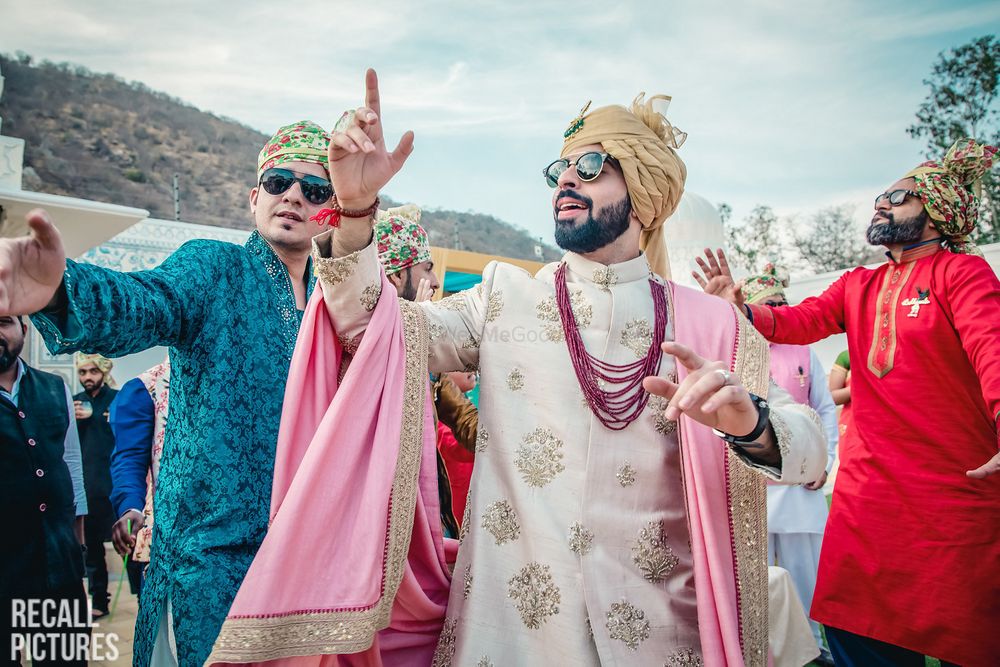 Photo of Baraat photo with groom in off white sherwani