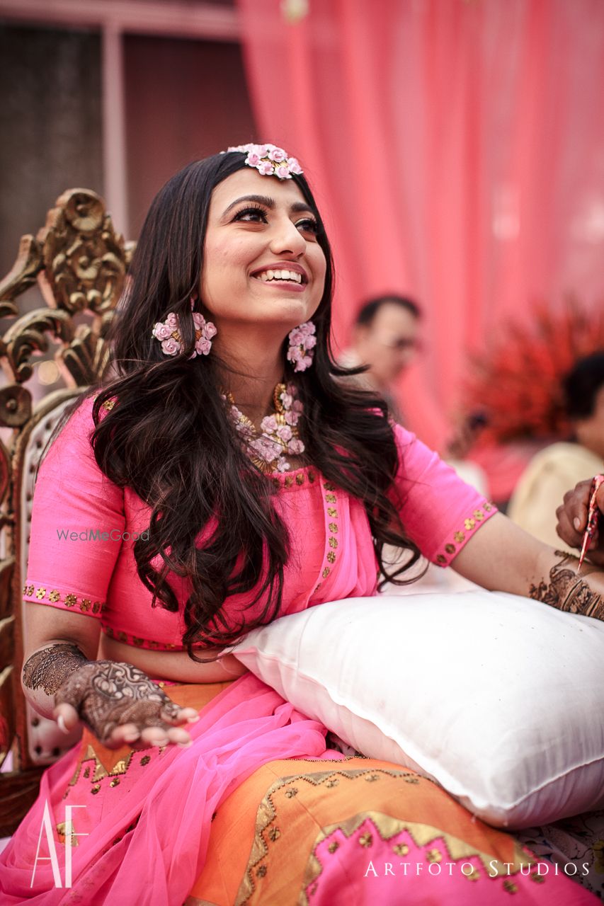 Photo of Bridal mehendi portrait wearing floral jewellery