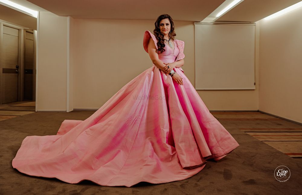 Photo of floor length light pink gown with train