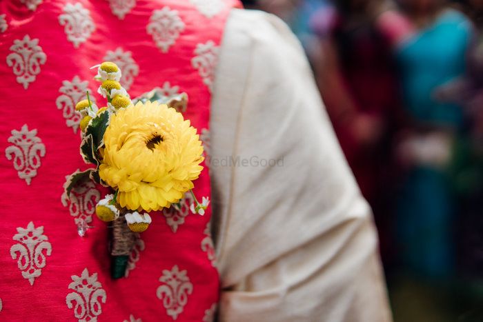 Photo of Groomwear detailing with flower in pocket