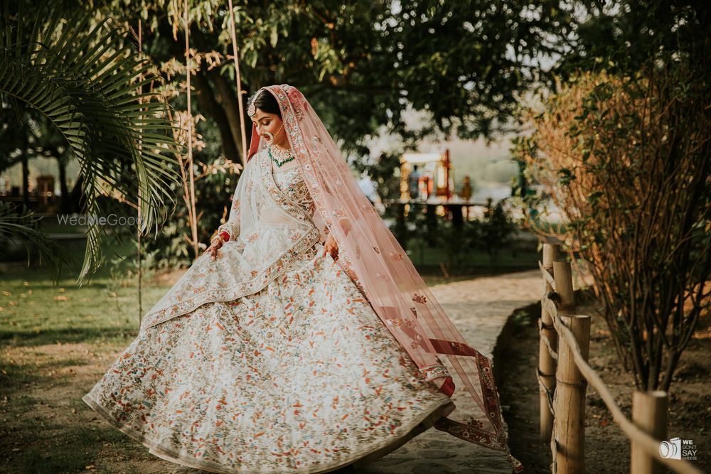 Photo of A twirling bridal portrait perfectly captured.