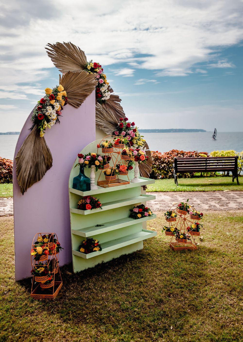 Photo of Unique floral décor elements at the entrance for a beach wedding